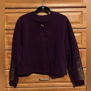 Purple puma sweatshirt with gold detail on sleeves